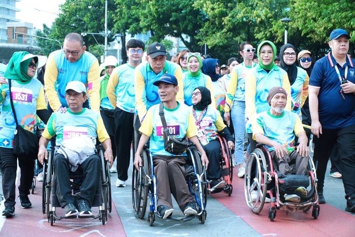 1765105549905-7000-penyandang-disabilitas-ramikan-fun-walk-hdi-2025-1765086403670