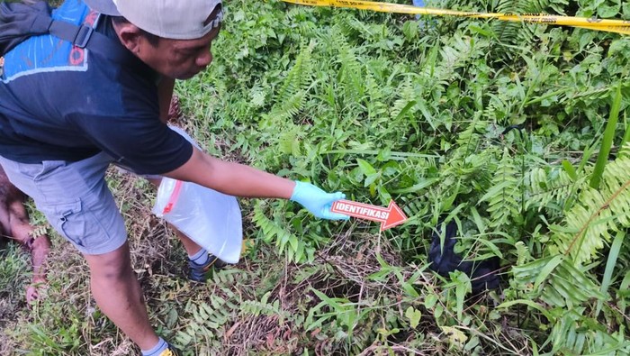 1767373523971-polisi-melakukan-olah-tkp-pengeroyokan-di-kabupaten-sarmi-1767344380304_169